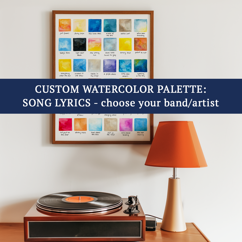 Bright watercolor palette swatches relating to song lyrics, with text advertising custom color palette for band. Placed in a frame hanging above a record player.