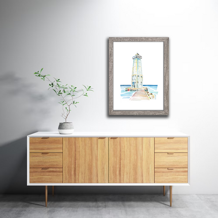 Framed watercolor painting of the lighthouse in Frankfort, Michigan, on the shore of Lake Michigan.