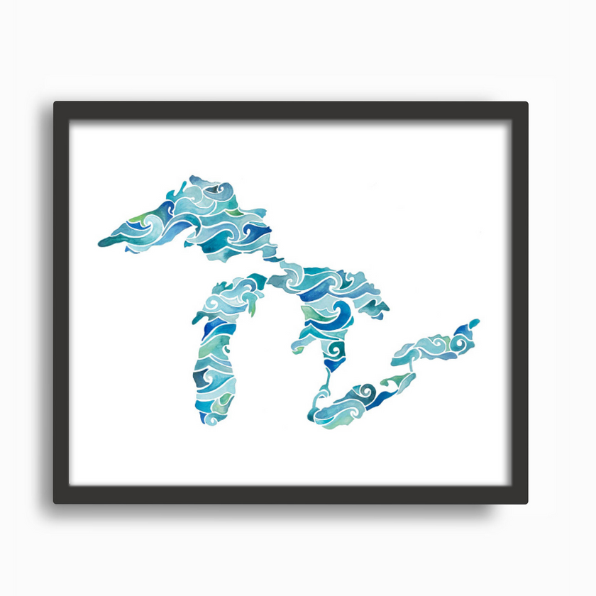 Watercolor painting of the Great Lakes, with waves in brilliant shades of blue and green, placed in a simple black frame.