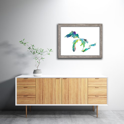 Bright, multi-colored watercolor painting of Michigan and the Great Lakes, created by Emily Frushour. Framed and hanging as home decor.