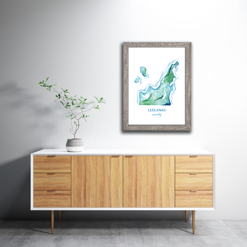 Framed watercolor map of Leelanau County, Michigan, in rich blues and greens.