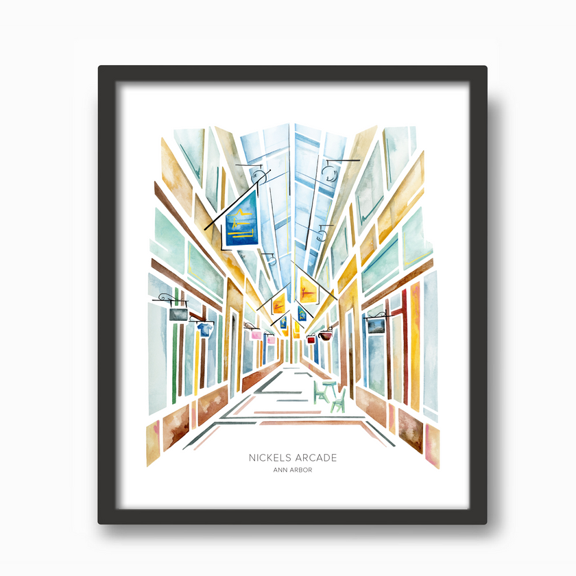 Black frame with colorful watercolor painting of Nickels Arcade shopping center in Ann Arbor, featuring shops and cafes and windows.