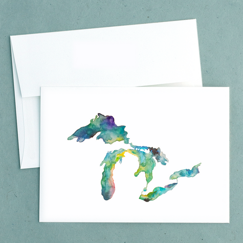 Folded notecard with a watercolor painting of the Great Lakes and Michigan, painted by Emily Frushour.