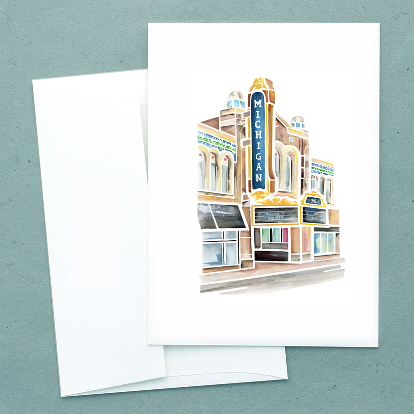 Folded notecard with a watercolor painting of the Michigan Theater in Ann Arbor, created by Emily Frushour.