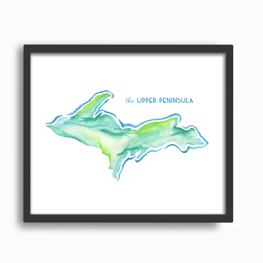 Watercolor painting of a map of Michigan's upper peninsula, created in shades of green and blue, placed in a black frame.