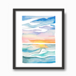 Colorful and bright watercolor painting of a lake at sunset in shades of blue, pink and yellow, in a simple black frame.