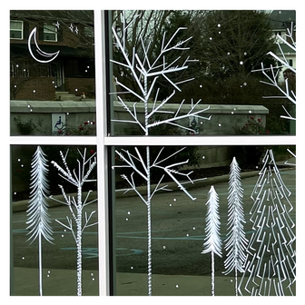 Delicate winter window art illustration of a forest with snowflakes and moon, created by artist Emily Frushour.